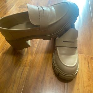 Chunky platform like loafers.